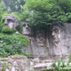 Illustration for article titled Chinas Mount Rushmore Has Green Leafy Hair
